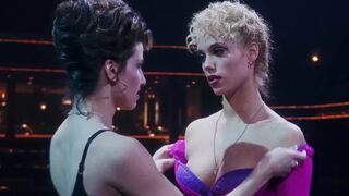 After fantasizing about her since Saved By The Bell, Gina Gershon probably signed on for Showgirls the second she read that she would get to softly caress Elizabeth Berkley's perky tits in this scene .