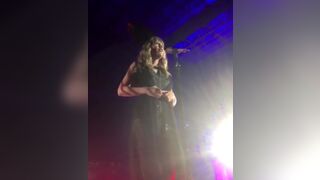 Taylor Swift disrobing on stage