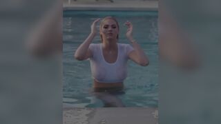 Kate Upton in a wet t shirt. Teasing us with her nipples.