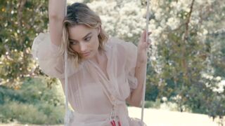A quiet day in paradise with Margot Robbie. Dream wife.