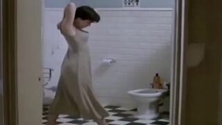 A young Kate Beckinsale undressing in the 1994 film, Uncovered