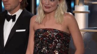 Margot Robbie on stage, realizing she mistakenly put on the vibrating panties after you turn it on...