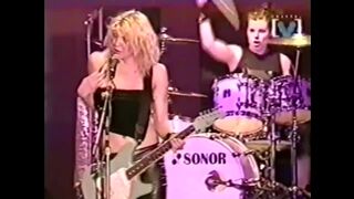 Courtney Love rocking out with her tits out