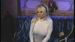Pamela Anderson teases Howard Stern on his radio show.