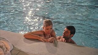 scarlett Johansson getting out of a pool in Scoop
