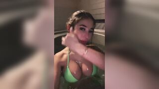 Angie Varona in a hot tub
