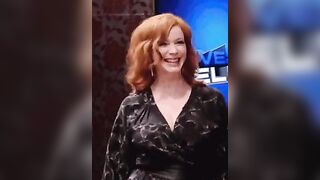 Christina Hendricks with a little bounce in her step.