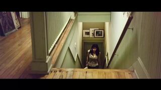Alexandra Daddario walking up the stairs