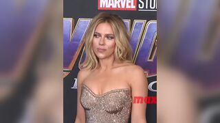 Scarlett Johansson presenting her booty in a tight dress